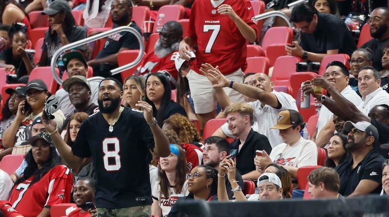 Atlanta Falcons fans react after an interception from Atlanta Falcons quarterback Jack Strand in the second half of an NFL game against the Carolina Panthers at Mercedes-Benz Stadium in Atlanta on Sunday, Sept. 20, 2026. (Miguel Martinez/AJC)