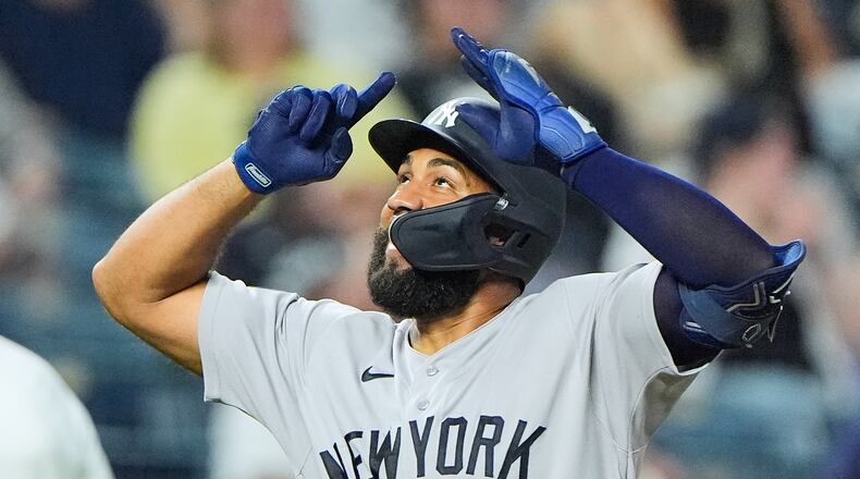 New York Yankees' Amed Rosario celebrates after hitting a two-run home run during the ninth inning of baseball game against the Kansas City Royals, Tuesday, May 26, 2026, in Kansas City, Mo. (AP Photo/Charlie Riedel)