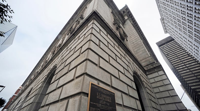 A federal judicial review committee upheld a private reprimand by the U.S. Court of Appeals for the 11th Circuit of a federal judge for having a two-year affair with a high-ranking police officer. The Atlanta Police Department is investigating whether a high-ranking officer had an affair with a federal judge involving courthouse sex. (Mike Stewart/AP file)