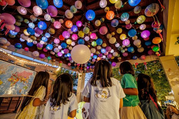 Come early to make a lantern, then march in Duluth's Lantern Parade at Town Green on Friday. (Courtesy of Duluth Lantern Parade)