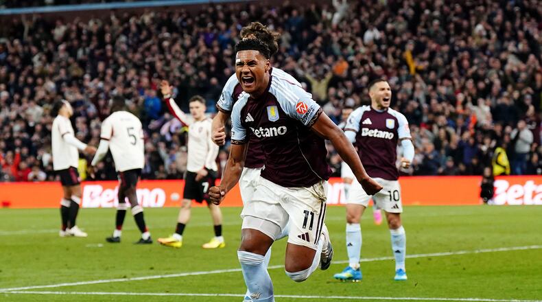 Aston Villa's Ollie Watkins celebrates scoring their side's third goal during the English Premier League soccer match between Aston Villa and Liverpool in Birmingham, England, Friday, May 15, 2026. (Jacob King/PA via AP)