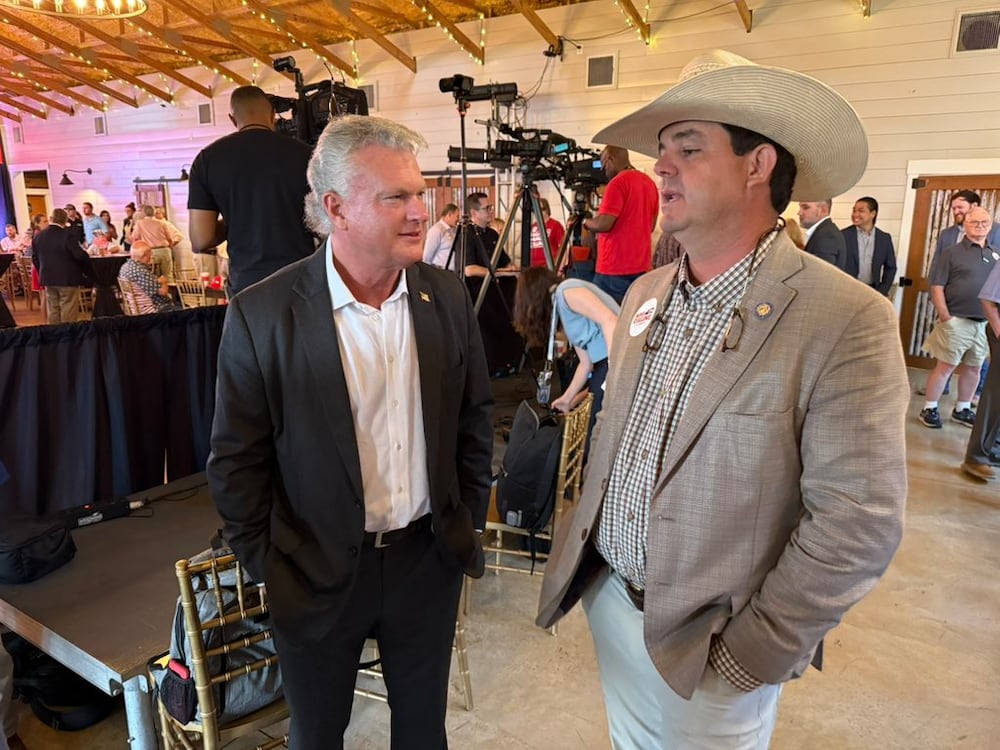 U.S. Rep. Mike Collins (left) enjoyed a good turnout for his Senate launch event in Jackson on Tuesday.