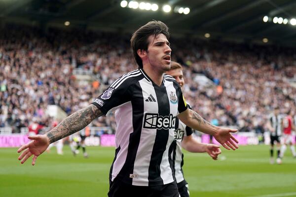 Newcastle United's Sandro Tonali celebrates scoring the opening goal during the English Premier League soccer match between Newcastle United and Manchester United in Newcastle upon Tyne, England, Sunday, April 13, 2025. (Owen Humphreys/PA via AP)