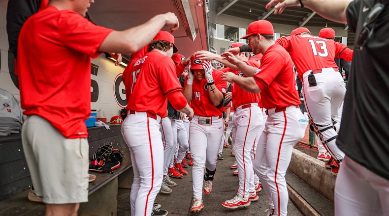 Georgia infielder Slate Alford (44) gets head-slapping congratulations after hitting a home run during Georgia’s game against Northern Colorado at Foley Field earlier this month. The Bulldogs, who have hit 56 home runs this season, will look to get back on track offensively this week after a weekend sweep at the hands of Kentucky. (Kari Hodges/UGA Athletics)