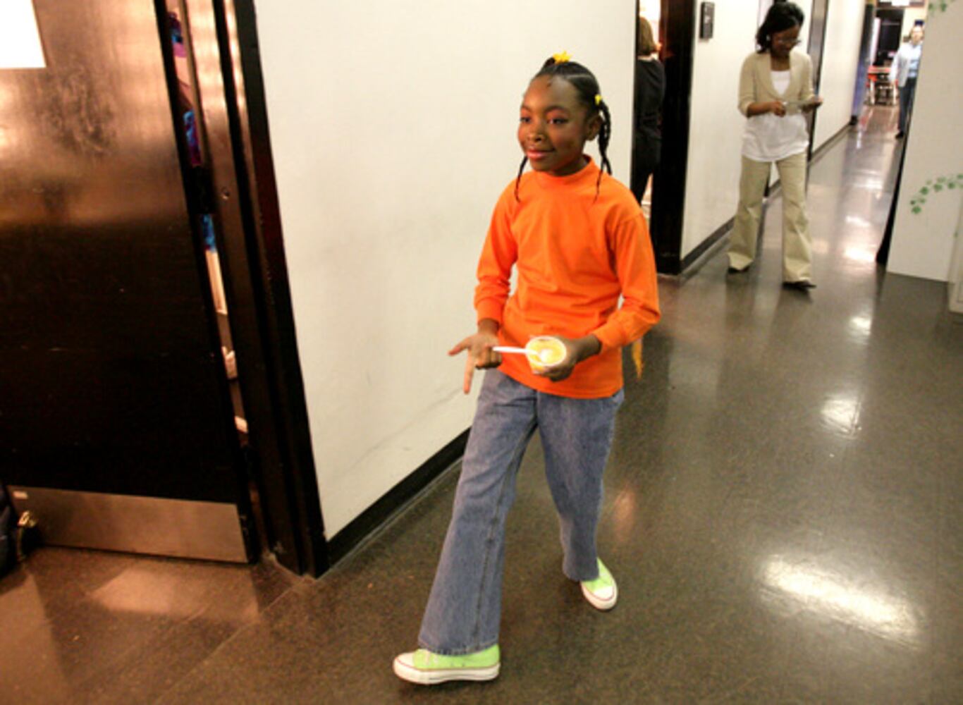 Appling girl immersed in Dr. Seuss' world