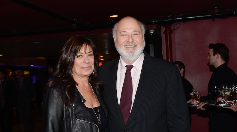 FILE - Actor Rob Reiner and his wife, Michele Singer, arrive for an event on Dec. 17, 2013, in New York. (Photo by Evan Agostini/Invision/AP, File)