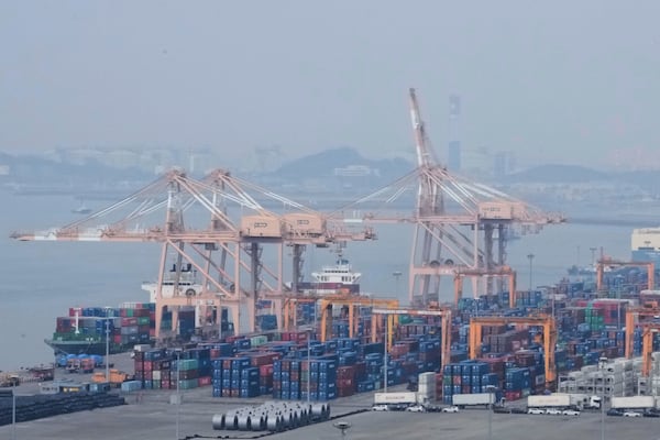 Cranes and shipping containers are seen at a port in Pyeongtaek, South Korea, Wednesday, April 2, 2025. (AP Photo/Ahn Young-joon)