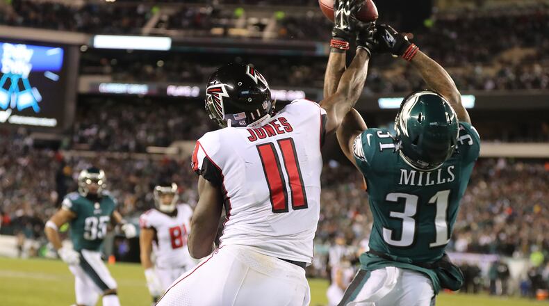 Eagles cornerback Jalen Mills defends against Falcons wide receiver Julio Jones breaking up a pass to the endzone during the first half in their NFC Divisional Game on Saturday, January 13, 2018, in Philadelphia. Curtis Compton/ccompton@ajc.com