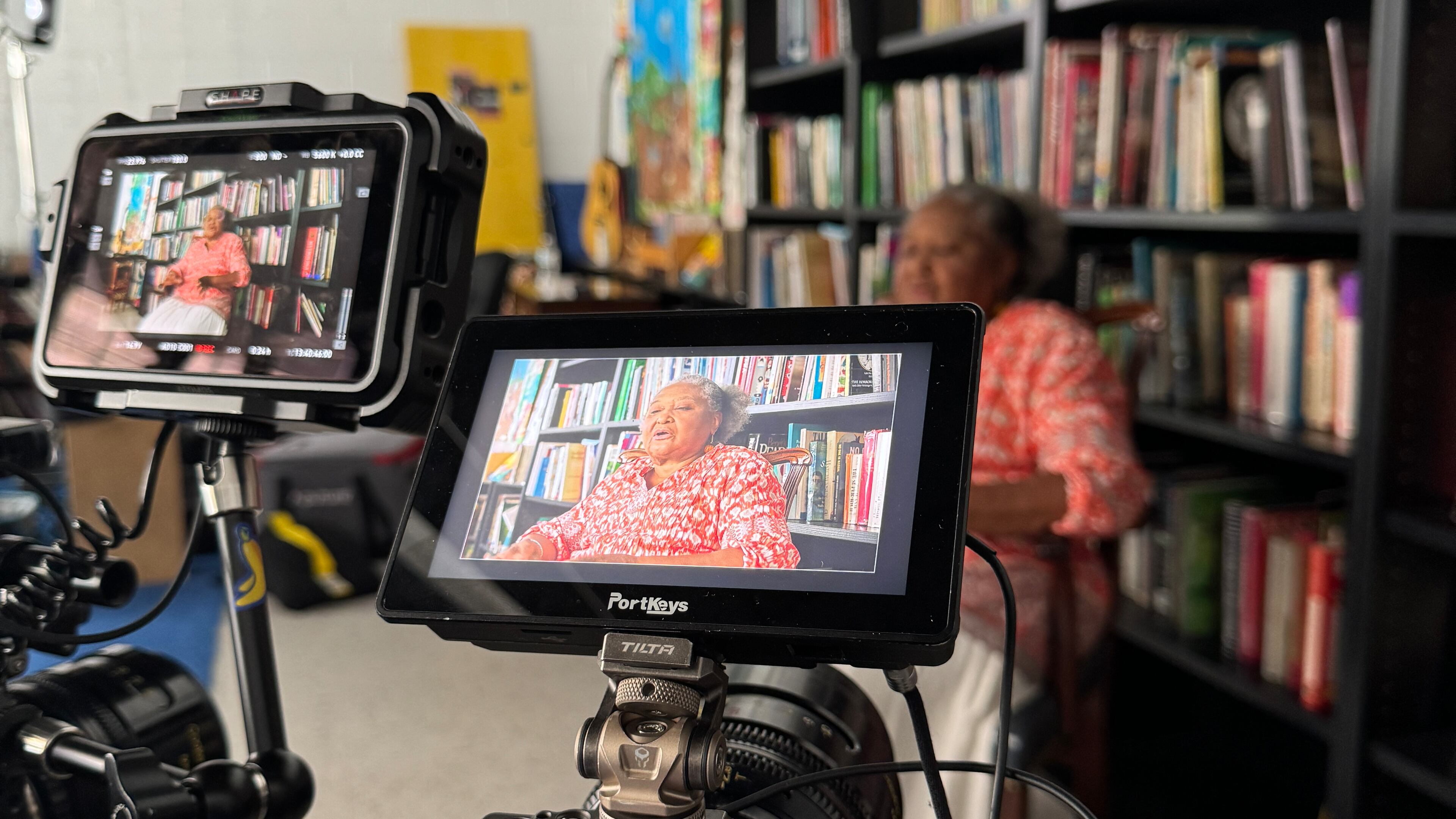 Filmmaker Jonathan Banks films ArtsXchange founder Alice Lovelace for his documentary short "Say Yes to Destiny," which will screen along with three other shorts at ArtsXchange on Friday, June 20, 2025. (Courtesy of Jonathan Banks)