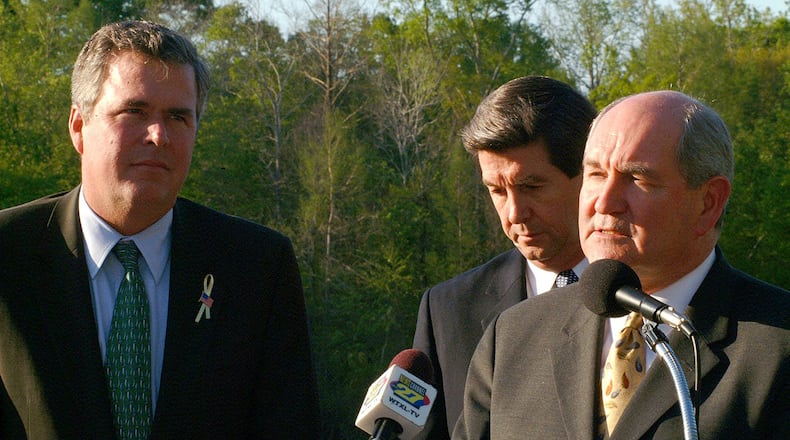 Florida Gov. Jeb Bush, left, Alabama Gov. Bob Riley, center, and Georgia Gov. Sonny Perdue at a press conference after a meeting to discuss issues involving water usage affecting the Apalachicola-Flint-Chattahoochee river system in 2003. AP /Bruce Brewer