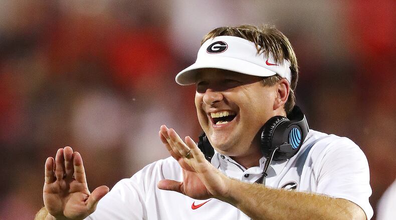 Georgia head coach Kirby Smart is all smiles during the second half of a 31-3 victory over Mississippi State. (Curtis Compton/AJC)