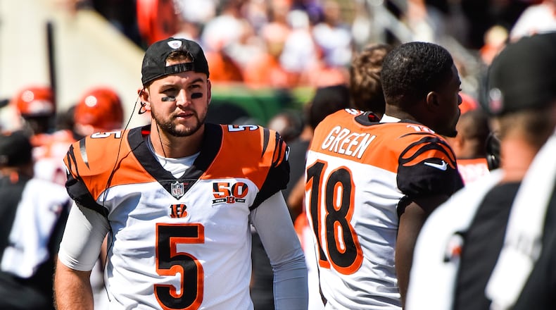 Former Cincinnati Bengals quarterback AJ McCarron walks on the sideline during their 20-0 loss to the Baltimore Ravens Sunday, Sept. 10 at Paul Brown Stadium in Cincinnati. NICK GRAHAM/STAFF