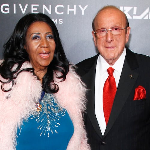 FILE - Aretha Franklin, left, and Clive Davis, attend Keep a Child Alive's 2014 Black Ball in New York on Oct. 30, 2014. (Photo by Andy Kropa/Invision/AP, File)
