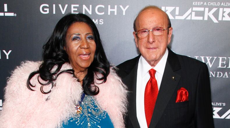 FILE - Aretha Franklin, left, and Clive Davis, attend Keep a Child Alive's 2014 Black Ball in New York on Oct. 30, 2014. (Photo by Andy Kropa/Invision/AP, File)