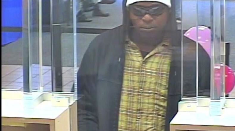 Authorities are searching for at least two people connected to a serial robbery ring in metro Atlanta.