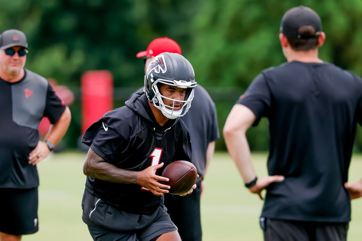 Falcons quarterback Tua Tagovailoa — pictured taking part in practice Monday, June 8, 2026 — says that despite starting over after six seasons with the Dolphins, he's still able to live out the dream he had as a 10-year-old of playing in the NFL. (Erik S. Lesser for the AJC)