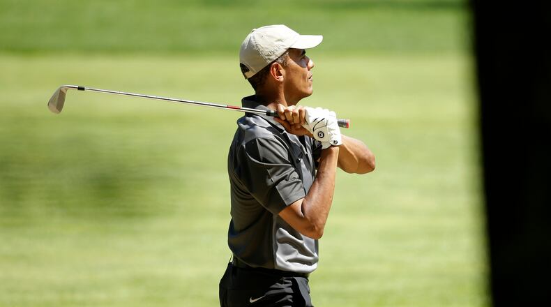 President Barack Obama follows through on a swing while golfing in 2015, at Farm Neck Golf Club, in Oak Bluffs, Mass., on the island of Martha’s Vineyard. (AP Photo/Steven Senne)
