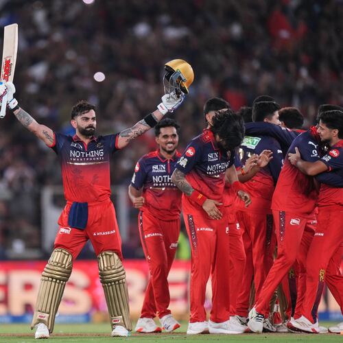 Royal Challengers Bengaluru's Virat Kohli celebrates with teammates after their win in the Indian Premier League final cricket match against Gujarat Titans in Ahmedabad, India, Sunday, May 31, 2026. (AP Photo/Ajit Solanki)