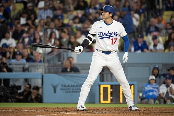 Los Angeles Dodgers' Shohei Ohtani bats during the sixth inning of a baseball game against the Arizona Diamondbacks in Los Angeles, Monday, May 19, 2025. (AP Photo/Kyusung Gong)