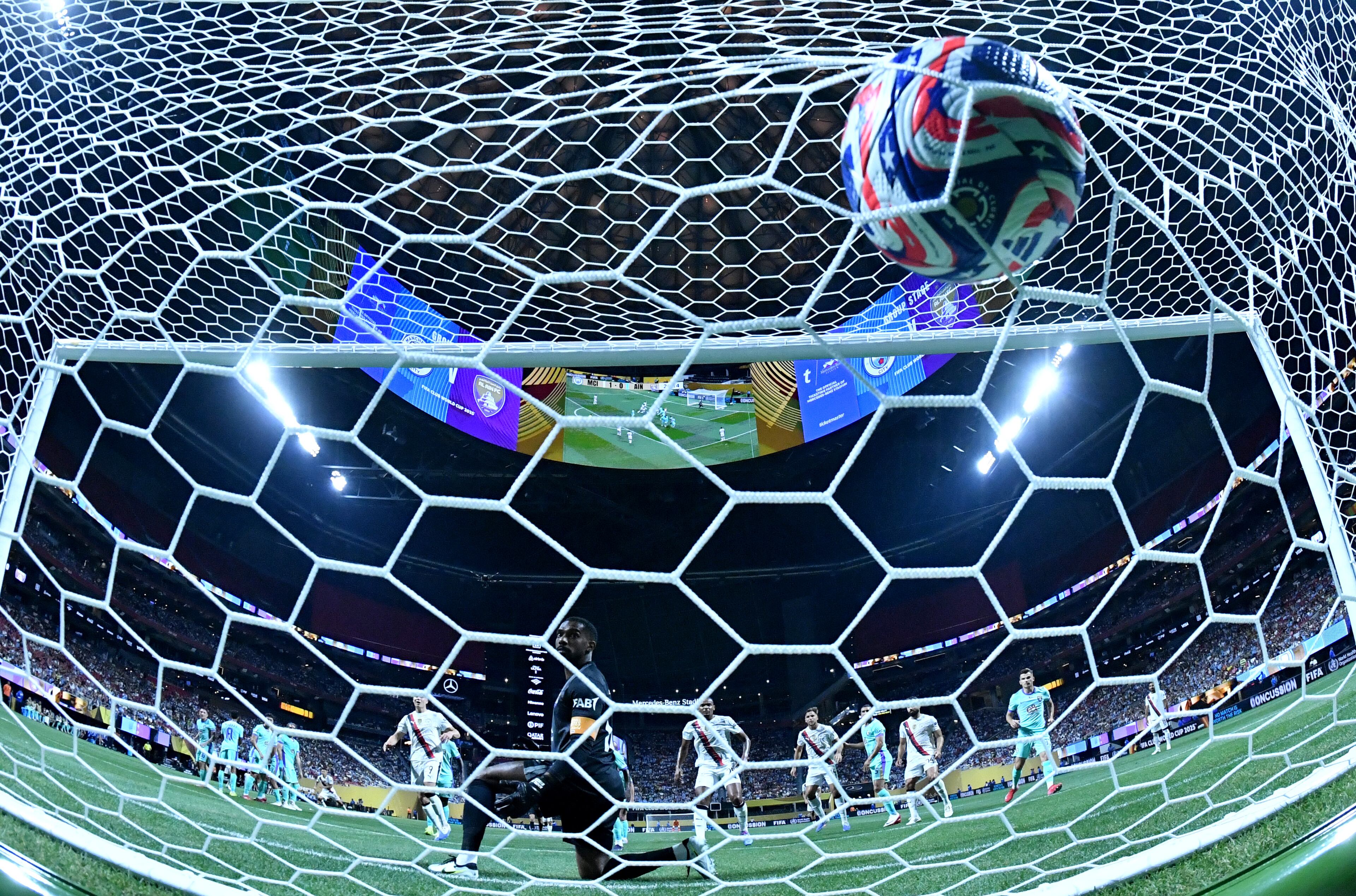 Al Ain's goalkeeper Khalid Eisa (17) looks back after he was not able to block a shot by Manchester City's midfielder Claudio Echeverri (not pictured) during the first half in Club World Cup group G soccer match at Mercedes-Benz Stadium, Sunday, June 22, 2025, in Atlanta. Manchester City won 6-0 over Al Ain. (Hyosub Shin / AJC)