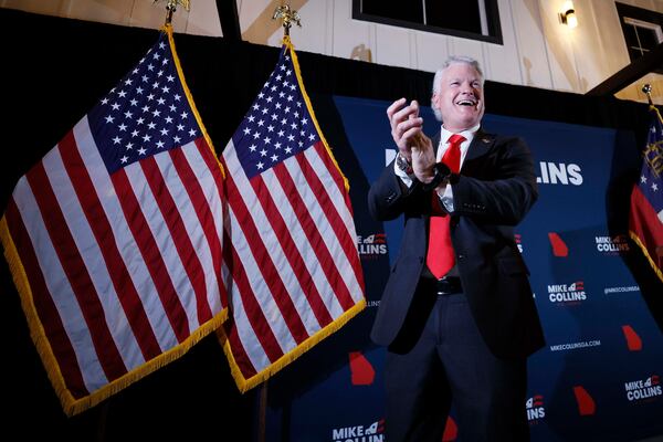 U.S. Rep. Mike Collins celebrates with supporters after winning the Republican U.S. Senate nomination last month. (Miguel Martinez/AJC)
