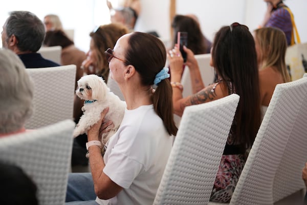 People attend the Palm Dog award ceremony at the 78th international film festival in Cannes, southern France, Friday, May 23, 2025. (AP Photo/Natacha Pisarenko)