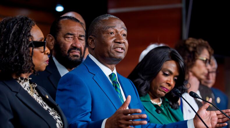 FILE - Rep. Cleo Fields, D-La., center, speaks to reporters at the Capitol in Washington on April 29, 2026. (AP Photo/J. Scott Applewhite, File)