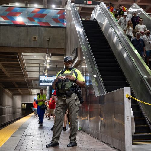 A MARTA Police officer stands on the platform of the SEC District MARTA station as fans attend the first FIFA match held in Atlanta on Monday, June 15, 2026. Recent violence on trains, including a stabbing, heightened safety concerns. (Ben Hendren for the AJC)