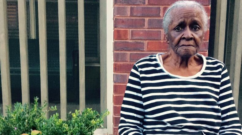 Longtime Summerhill activist Mattie Jackson outside her home, which stands where the city of Atlanta wants to put a reservoir/park to control flooding. (Photo by BILL TORPY)