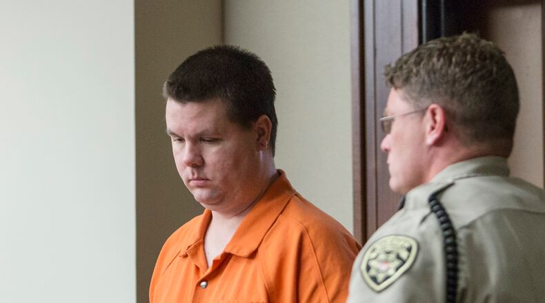 Justin Ross Harris enters the courtroom for a hearing Monday, Sept. 14, 2015, in Marietta, Ga. A judge on Monday refused to bar the news media from the courtroom during pretrial hearings for Harris, a Georgia man accused of killing his toddler son by leaving him in a vehicle on a hot day. (Kathryn Ingall/The Marietta Daily Journal via AP, Pool)