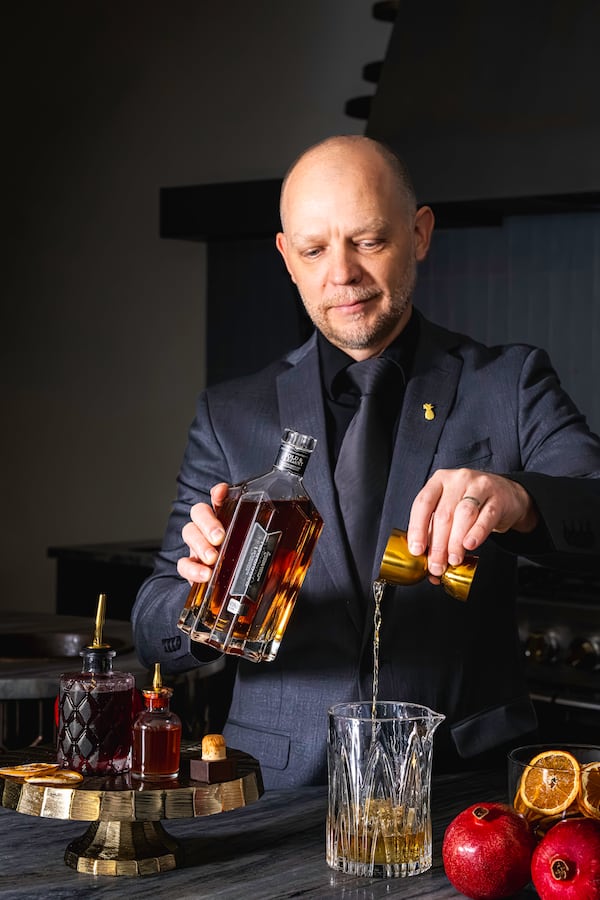 Vegas Placas, lead mixologist for the Loft at Soby’s New South Cuisine, makes his Forbidden Fruit Fashion using Forbidden bourbon, pomegranate syrup and house-made bitters. (Courtesy of Ariel Madison/Table 301)