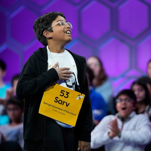 Sarv Dharavane, 11, of Tucker, reacts after spelling his word correctly in the finals of the Scripps National Spelling Bee on Thursday, May 29, 2025, in Oxon Hill, Md. (Julia Demaree Nikhinson/AP 2025)