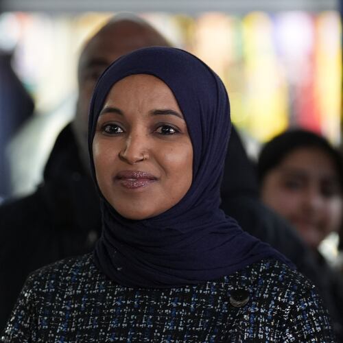 Rep. Ilhan Omar, D-Minn., stands during a press conference on Wednesday, Jan. 28, 2026, in Minneapolis. (AP Photo/Adam Gray)
