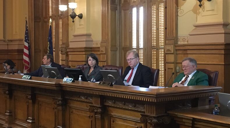 The State Election Board voted unanimously Tuesday to deny a petition seeking to switch Georgia to paper ballots before the general election on Nov. 6, 2018. From left: Board members Ralph Simpson, Rebecca Sullivan, David Worley and Seth Harp. MARK NIESSE / MARK.NIESSE@AJC.COM