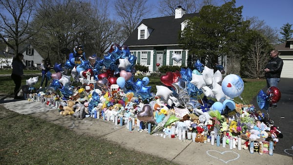 A memorial grows April 25, 2019, outside the Crystal Lake, Ill., home of Andrew "AJ" Freund Jr., 5, who was reported missing by his parents April 18, 2019, in Crystal Lake, Ill. AJ’S parents, Andrew Freund Sr., 60, and JoAnn Cunningham, 36, face multiple charges, including five counts of first-degree murder, in his April 15 death. The boy's body was found Aug. 24 wrapped in plastic and buried in a shallow grave.