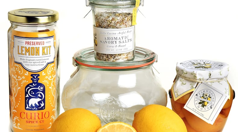 Gift items from Bella Cucina include (from left) a preserved lemon kit, a food citrus and fennel kit, and a jar of farmhouse lemons. Chris Hunt for The Atlanta Journal-Constitution