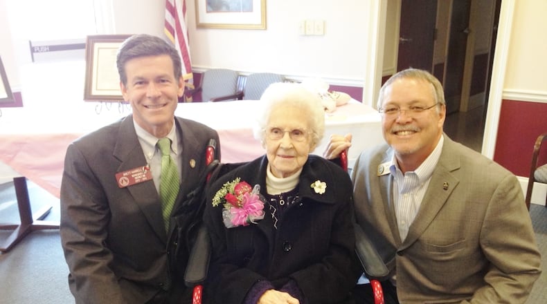 Runell Brooks Foster, seen here with State Rep. Brett Harrell and Snellville Councilman Bobby Howard in 2014, died Friday. She was 110. FILE PHOTO