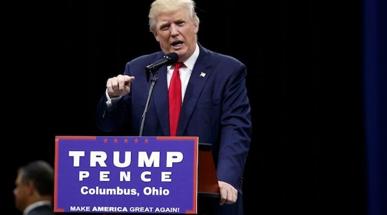 Republican presidential candidate Donald Trump speaks during a town hall event, Monday, Aug. 1, 2016, in Columbus, Ohio . (AP Photo/Evan Vucci)