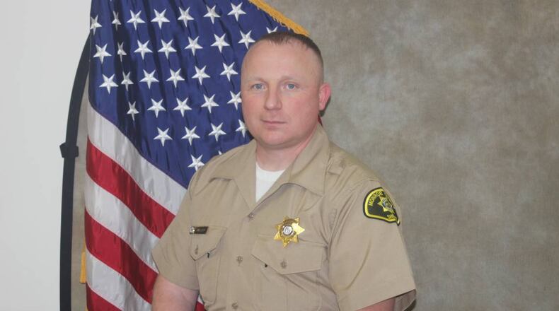 Monroe County sheriff's deputy William Miller was fired Thursday following an investigation into claims he propositioned a woman he arrested.