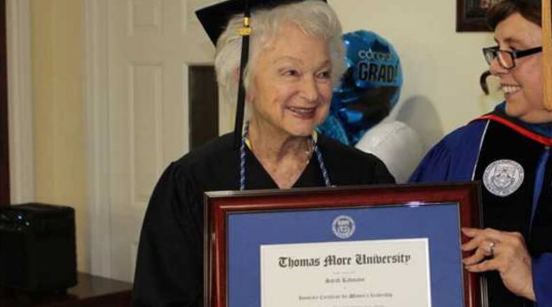 Sarah Blanken Kahmann smiles after receiving her honorary certificate.