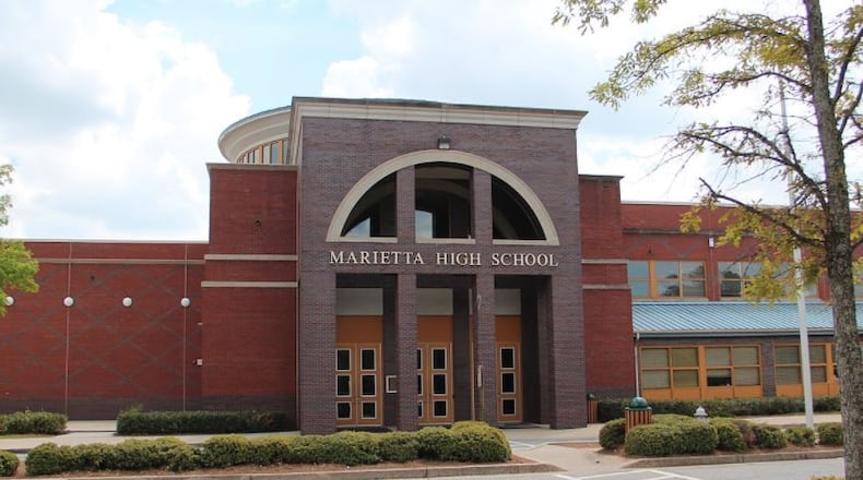 A new book charts the first generations of students who desegregated Marietta High School and follows the experiences of later generations who saw the dream of integration fall apart through a series of economic, social and demographic shifts.