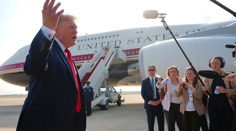 President Donald Trump speaks to reporters before boarding Air Force One, Wednesday, July 1, 2026, at Joint Base Andrews, Md. (AP Photo/Julia Demaree Nikhinson)