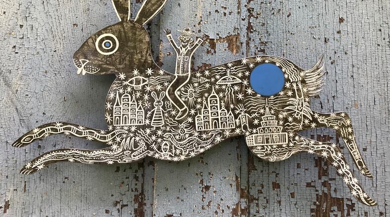 Tex S. Crawford created "Blue Moon Over Paradise" in tribute to Howard Finster. Crawford, a 2023 Finster Fest participant, does most of his work on repurposed roofing tin. Photo: Courtesy of Paradise Garden Foundation