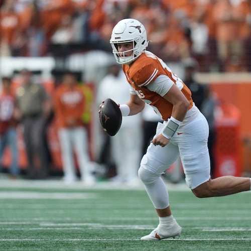 Texas quarterback Arch Manning (16) runs as he looks to throw against Vanderbilt during the first half of an NCAA college football game in Austin, Texas, Saturday, Nov. 1, 2025. (AP Photo/Eric Gay)