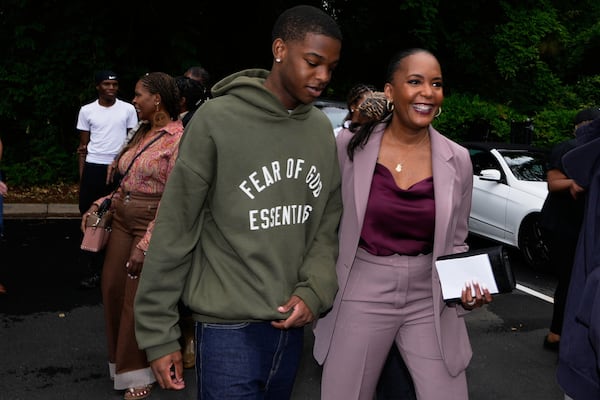 Democratic candidate for governor, Keisha Lance Bottoms, walks to vote early with her son, Langston Bottoms, in the Georgia Primary Election, Thursday, May 7, 2026, in Atlanta. (Brynn Anderson/AP)