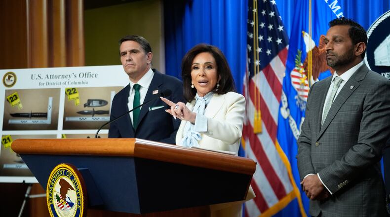 From left, Acting Attorney General Todd Blanche, U.S. Attorney Jeanine Pirro and FBI Director Kash Patel, speak during a news conference at the Department of Justice, on Monday April 27, 2026, in Washington, following the initial appearance in federal court of the suspected White House Correspondents Dinner gunman, Cole Tomas Allen of Torrance, California. (AP Photo/Manuel Balce Ceneta)