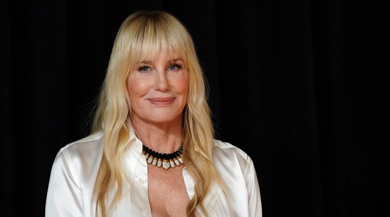 FILE - Daryl Hannah poses in the press room at the Oscars, Sunday, March 2, 2025, at the Dolby Theatre in Los Angeles. (Photo by Jordan Strauss/Invision/AP, File)