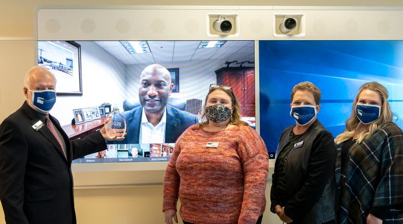 On behalf of Lockheed Martin, Roderick McLean accepted this award in an online presentation. Shown here, l-r, are Chattahoochee Tech President Dr. Ron Newcomb, Lockheed Martin Vice President and General Manager Roderick McLean, Chattahoochee Tech Board of Trustees Secretary and Win-Tech, Inc. President Allison Giddens, Chattahoochee Tech Vice President for Advancement Jennifer Nelson and Chattahoochee Tech Advancement Coordinator Amanda Henderson. (Courtesy of Chattahoochee Technical College)