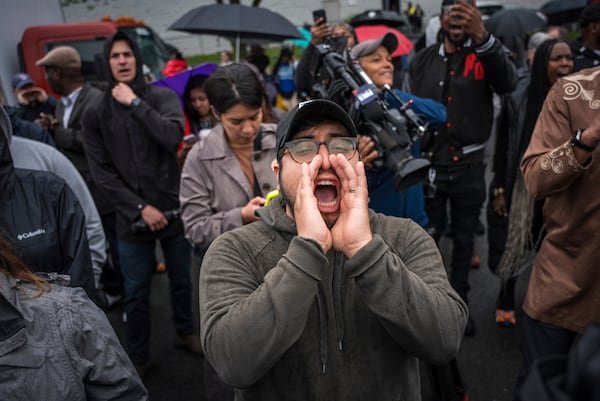 FILE - A protestor shouts, "Let him out", demanding the release of Newark Mayor Ras Baraka after his arrest while protesting at an ICE detention prison, in Newark, N.J., May 9, 2025, (AP Photo/Angelina Katsanis, File)