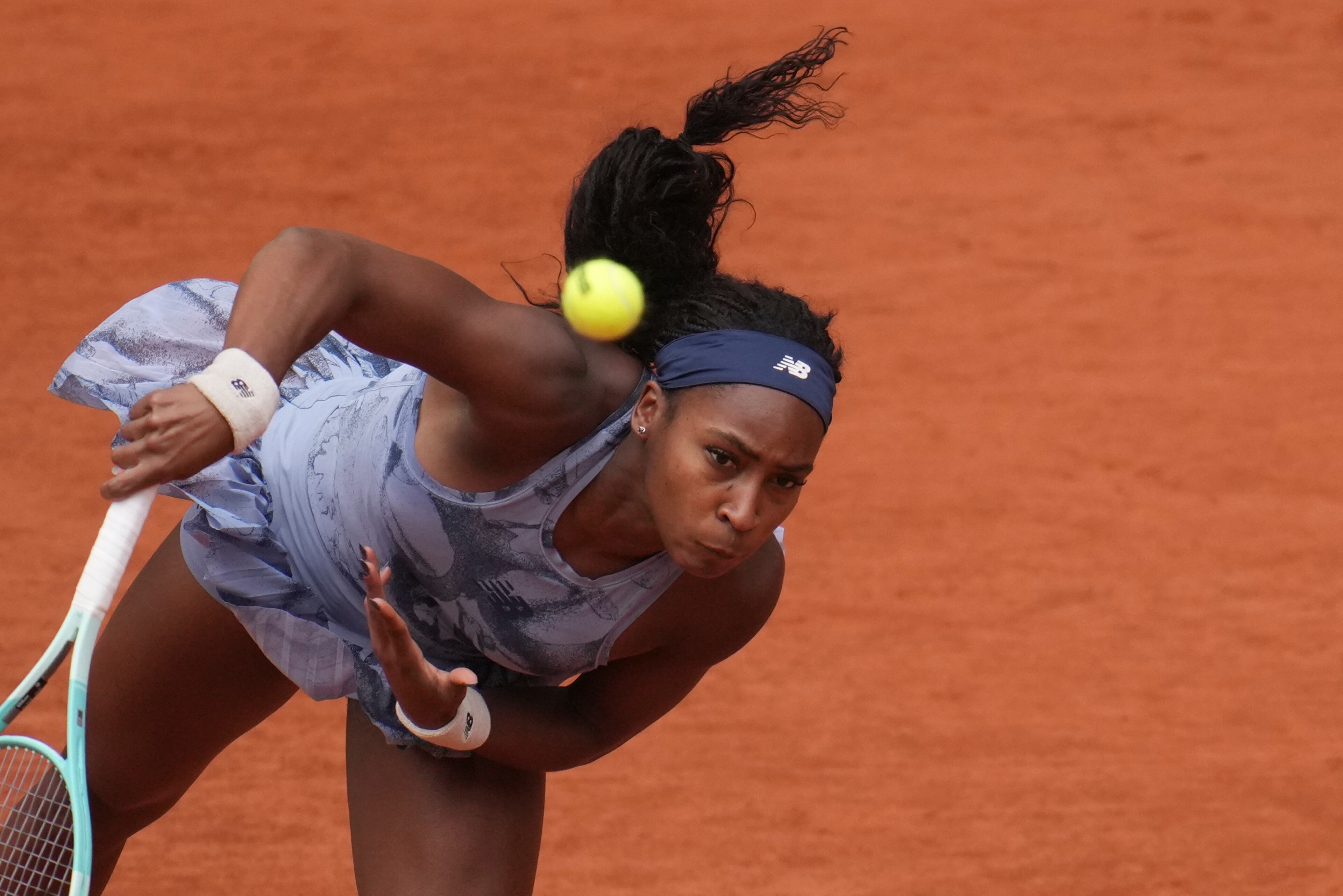 Coco Gauff of the U.S. serves against Aryna Sabalenka of Belarus during their final match of the French Tennis Open at the Roland-Garros stadium in Paris, Saturday, June 7, 2025. (AP Photo/Christophe Ena)